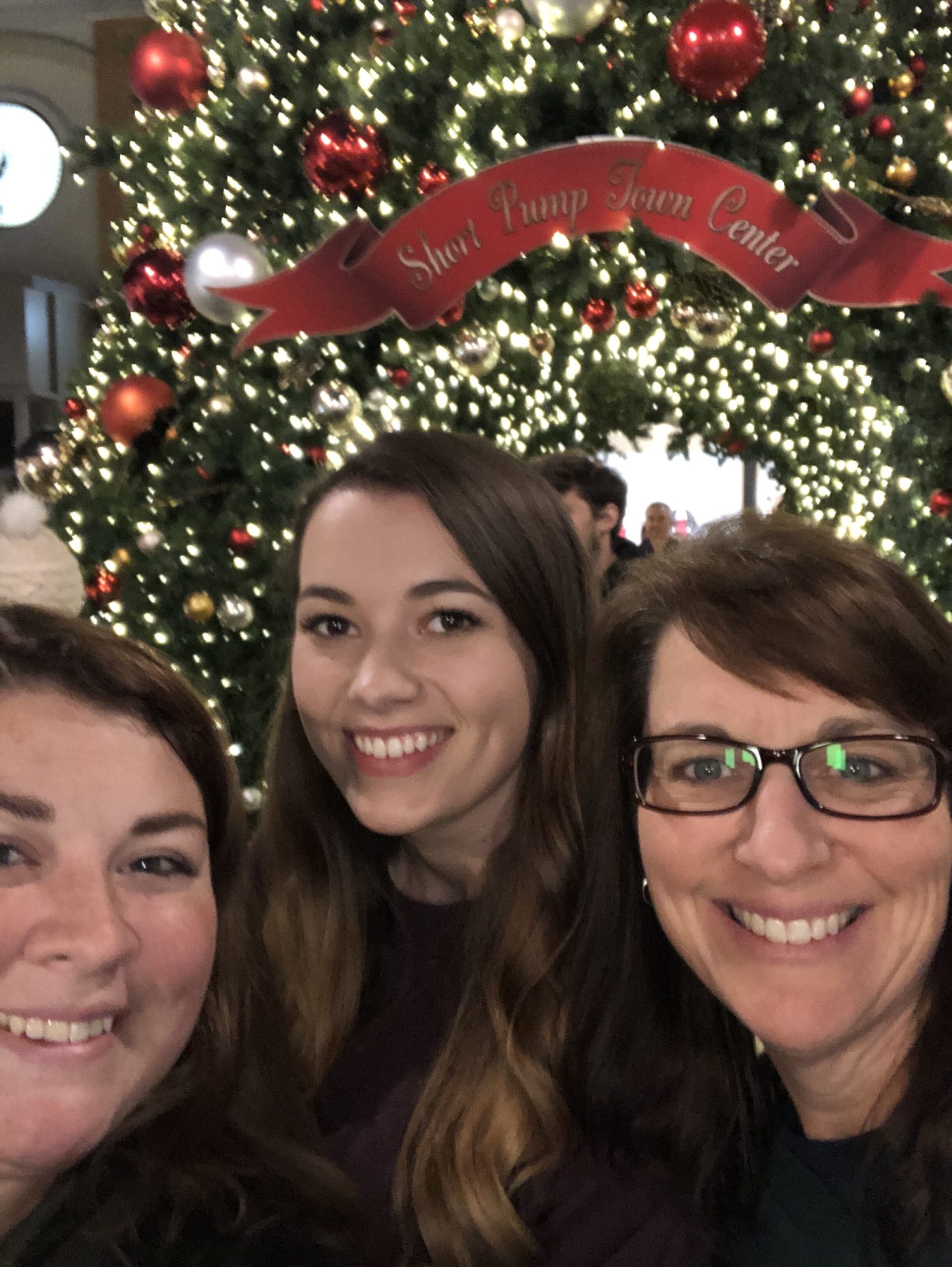 We made sure to grab our yearly photo in front of the Christmas tree while shopping at Short Pump