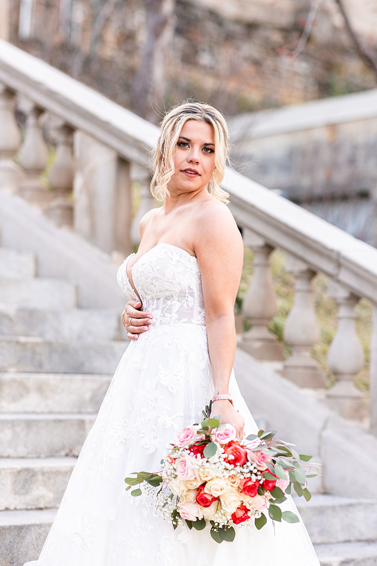 Bridal portrait on the stairs of Monument Terrace in downtown Lynchburg before the ceremony at this The Virginian Hotel wedding in Lynchburg, Virginia.