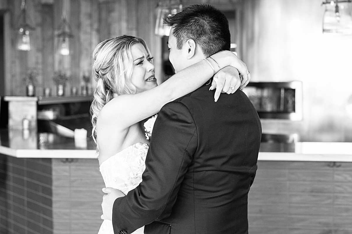 First look reaction with bride and groom before the ceremony at The Virginian Hotel in Lynchburg, Virginia.