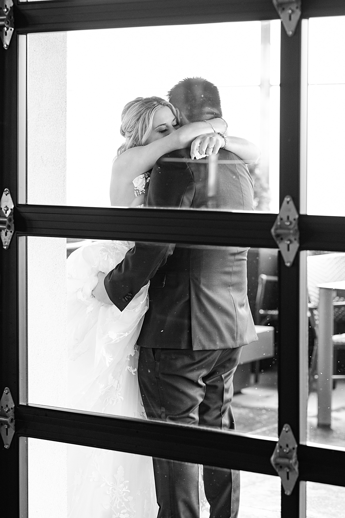 First look reaction with bride and groom before the ceremony at The Virginian Hotel in Lynchburg, Virginia.