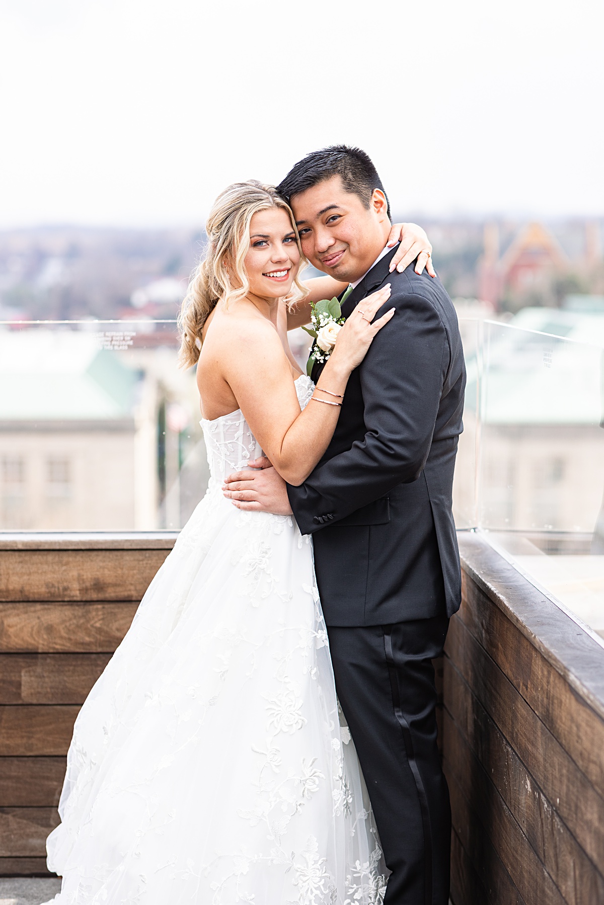 Portrait of the bride and groom on the rooftop of The Virginian Hotel in Lynchburg, Virginia.