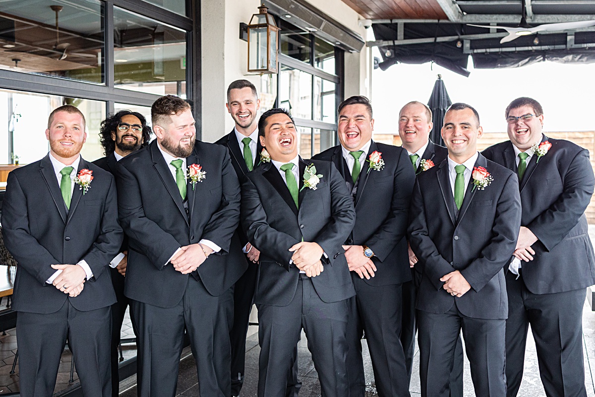 Groom and groomsmen portrait on the rooftop of The Virginian Hotel in Lynchburg, Virginia.