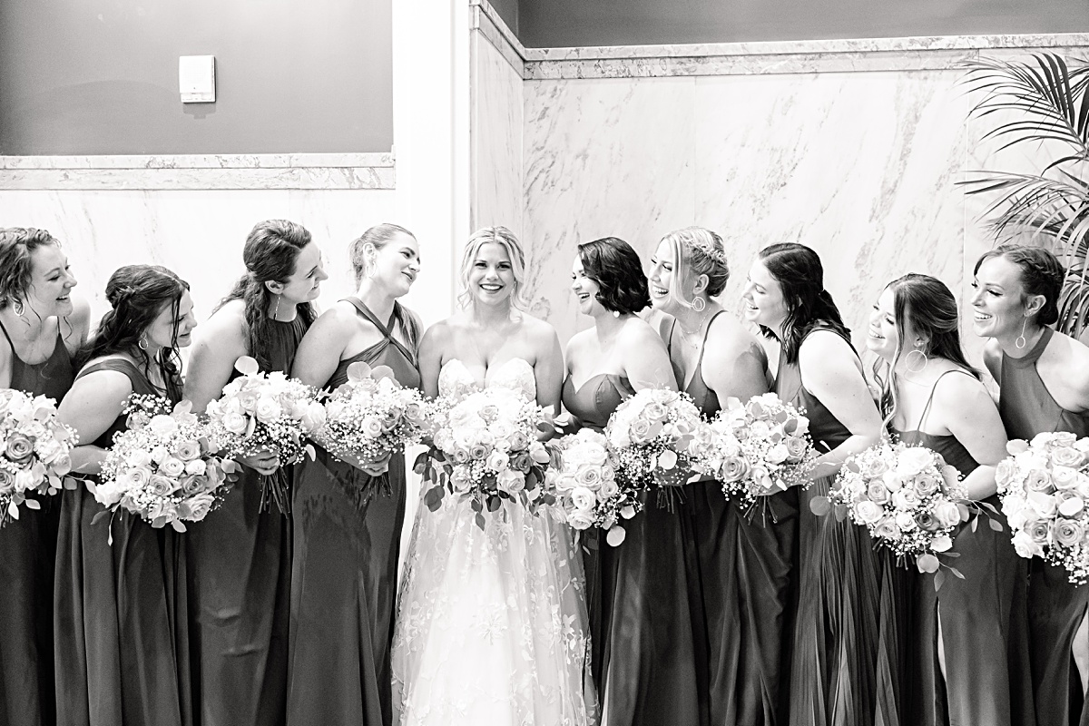 Bride and bridesmaids portrait in the lobby of The Virginian Hotel in Lynchburg, Virginia.