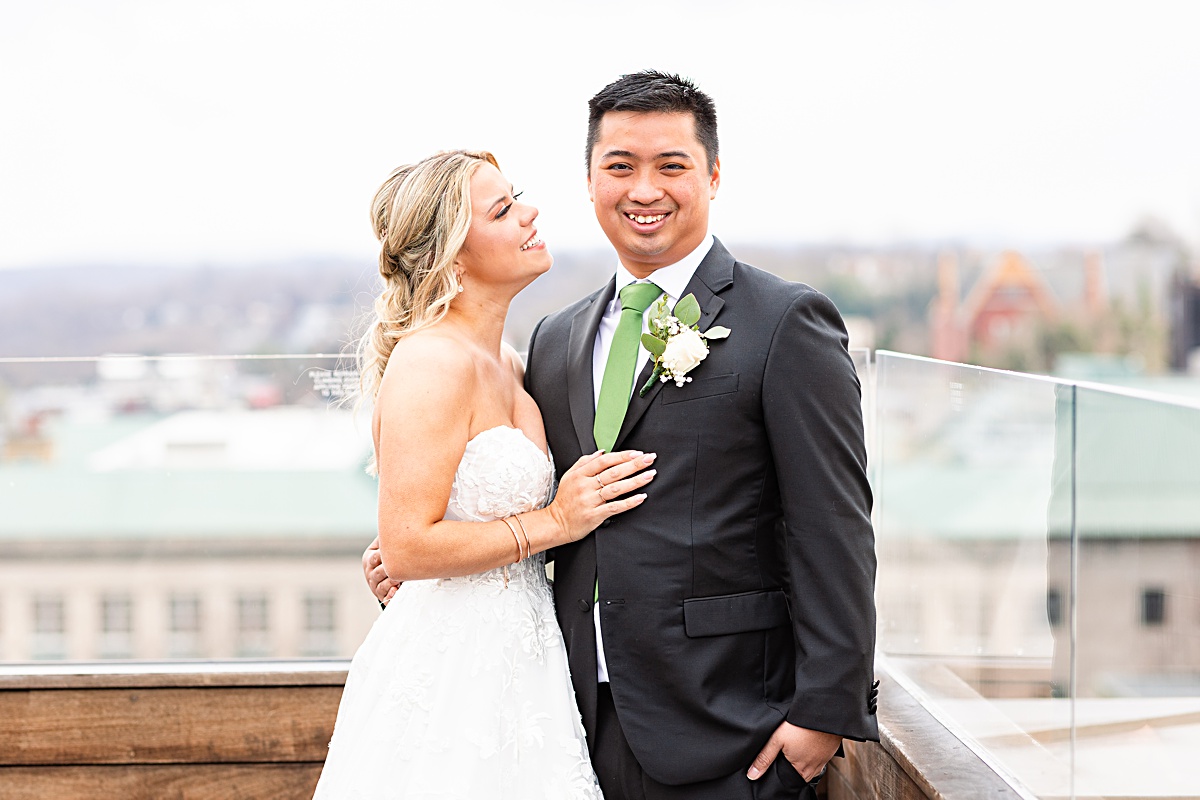 Portrait of the bride and groom on the rooftop of The Virginian Hotel in Lynchburg, Virginia.