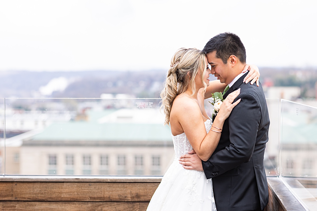 Portrait of the bride and groom on the rooftop of The Virginian Hotel in Lynchburg, Virginia.