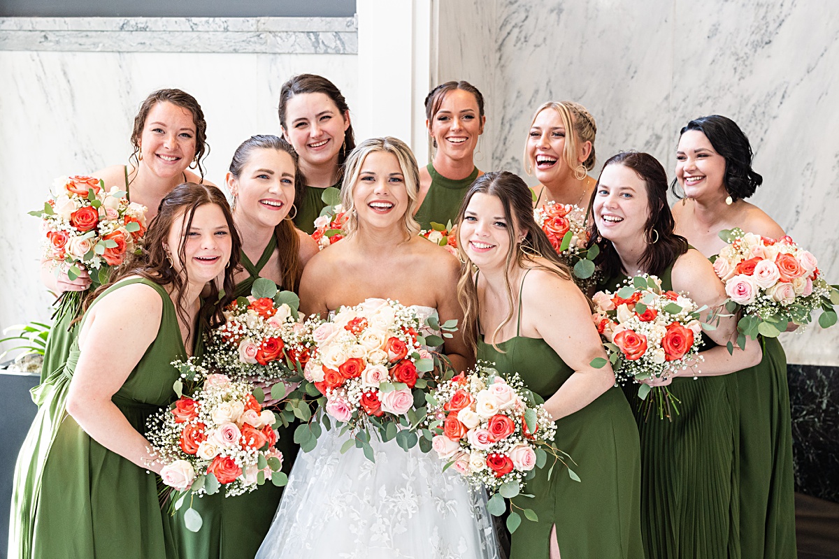 Bride and bridesmaids portrait in the lobby of The Virginian Hotel in Lynchburg, Virginia.