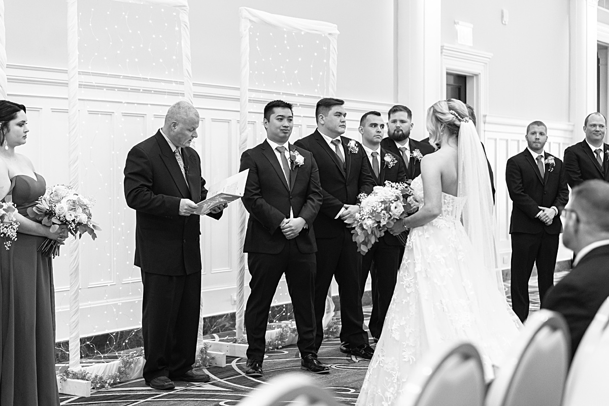 The groom crying at the alter as his bride entering the ceremony at The Virginian Hotel in Lynchburg, Virginia.