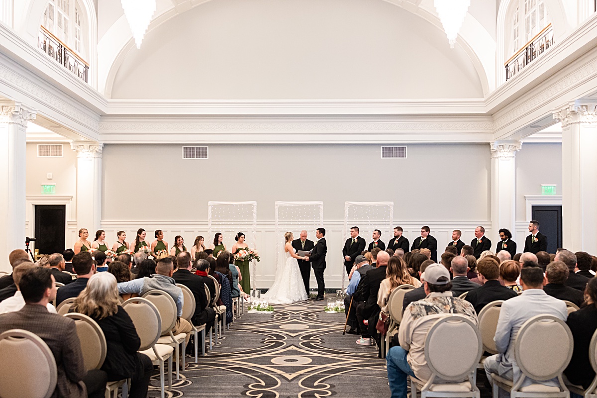 Ceremony photo of this winter wedding at The Virginian Hotel in Lynchburg, Virginia.