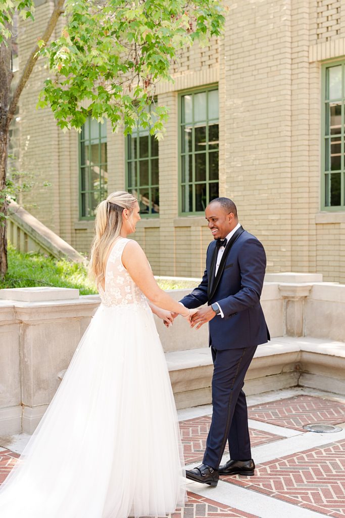 Bride and Groom first look portraits at Monument Terrace in Downtown Lynchburg, Virginia.