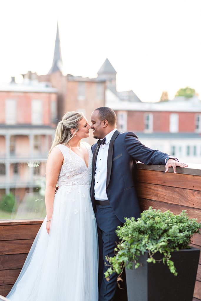 Rooftop sunset photos at this ballroom wedding at Virginian Hotel in Lynchburg, Virginia.