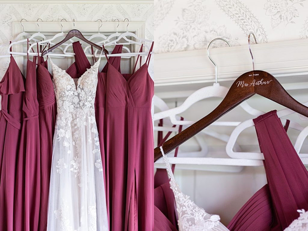 Bride and bridesmaids dresses on labeled hangers.