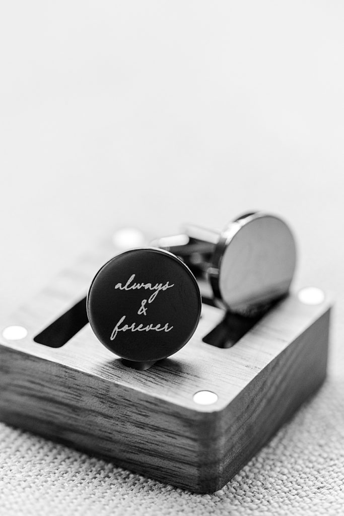 Groom details photo of the cuff links the bride gifted the groom.