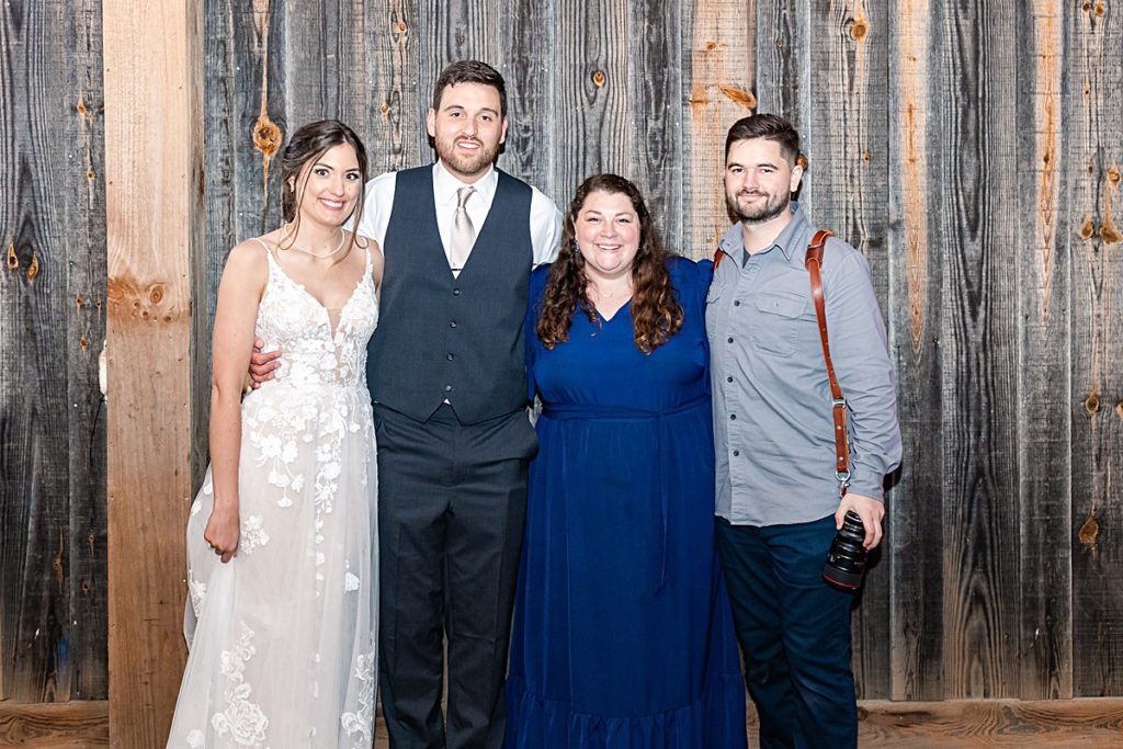 The bride and groom group photo with Emily and James, their photographers, at Sorella Farms in Lynchburg, Virginia.