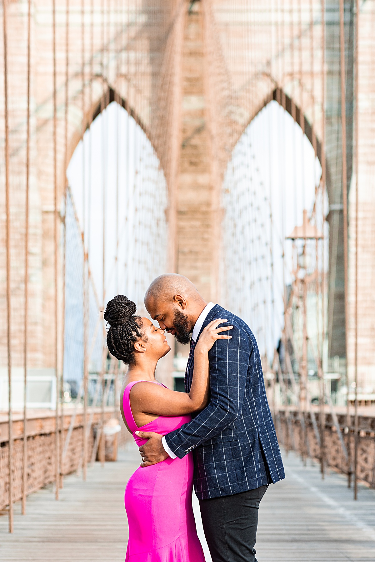 Destination engagement session at the Brooklyn Bridge and Domino Park in New York City.