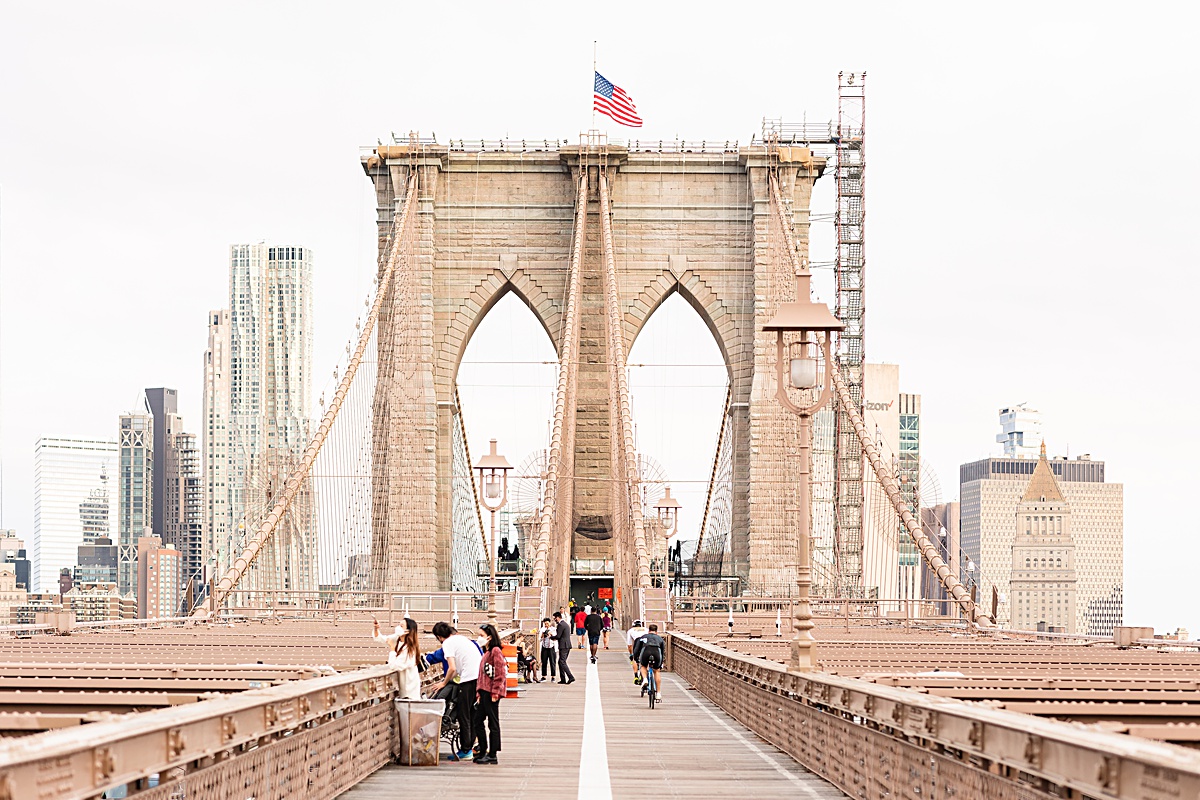 Destination engagement session at the Brooklyn Bridge and Domino Park in New York City.