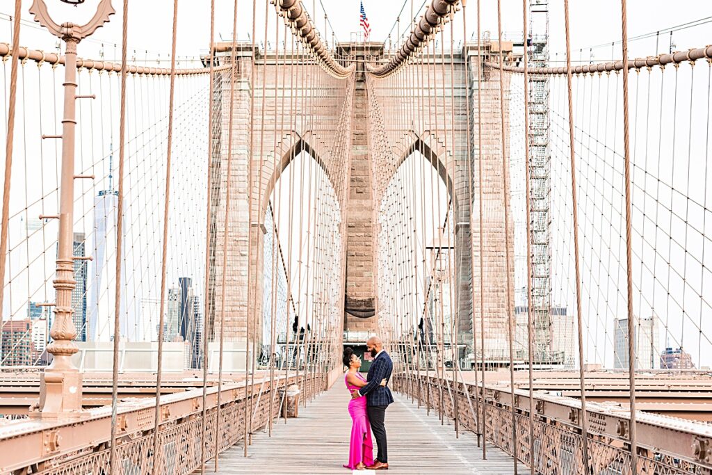 Destination engagement session at the Brooklyn Bridge and Domino Park in New York City.