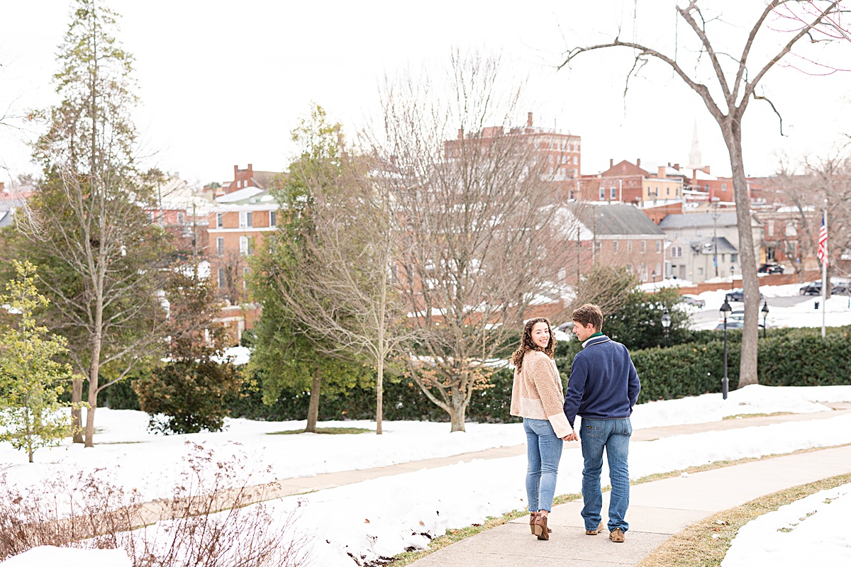 This Downtown Lexington engagement session is one of my favorites because we were able to use the snow that had fallen recently to make these images crisp, clean, and beautiful!