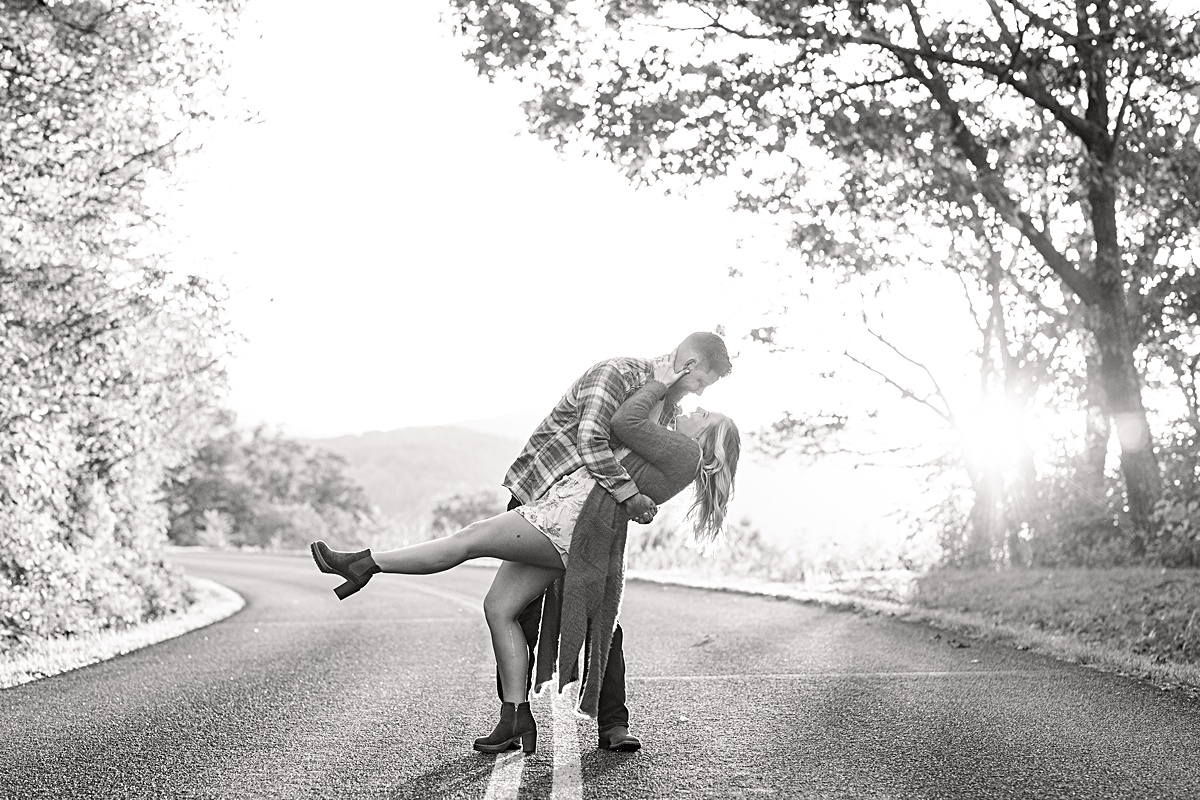 This Ravens Roost Overlook engagement session offers the perfect fall view of the Blue Ridge Mountains near Charlottesville, Virginia.