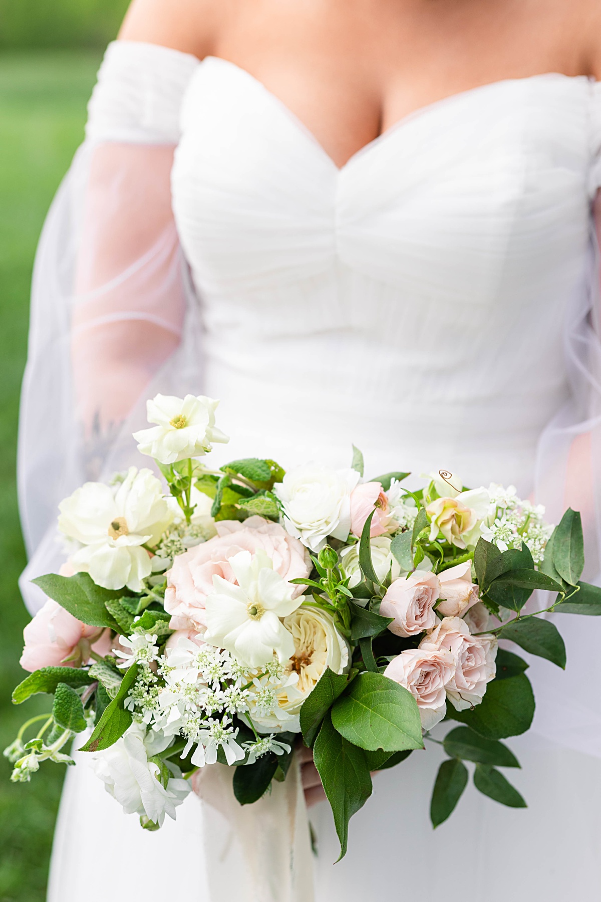 This elegant garden wedding at Cedar Oaks Farm features a classic car, stunning ceremony mountain view, unique bridal details, a boxer puppy, and a surprise baby gender reveal cake!