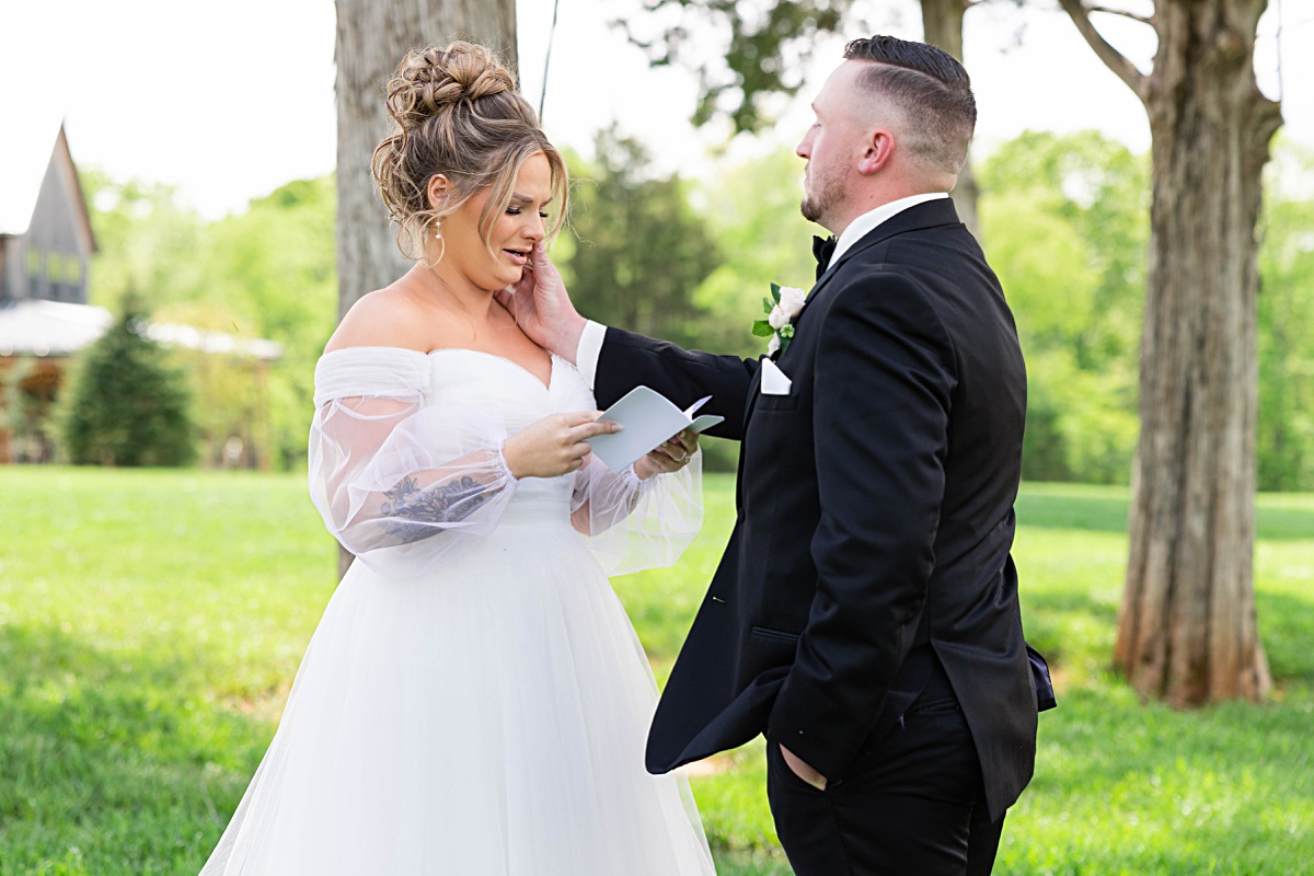 This elegant garden wedding at Cedar Oaks Farm features a classic car, stunning ceremony mountain view, unique bridal details, a boxer puppy, and a surprise baby gender reveal cake!