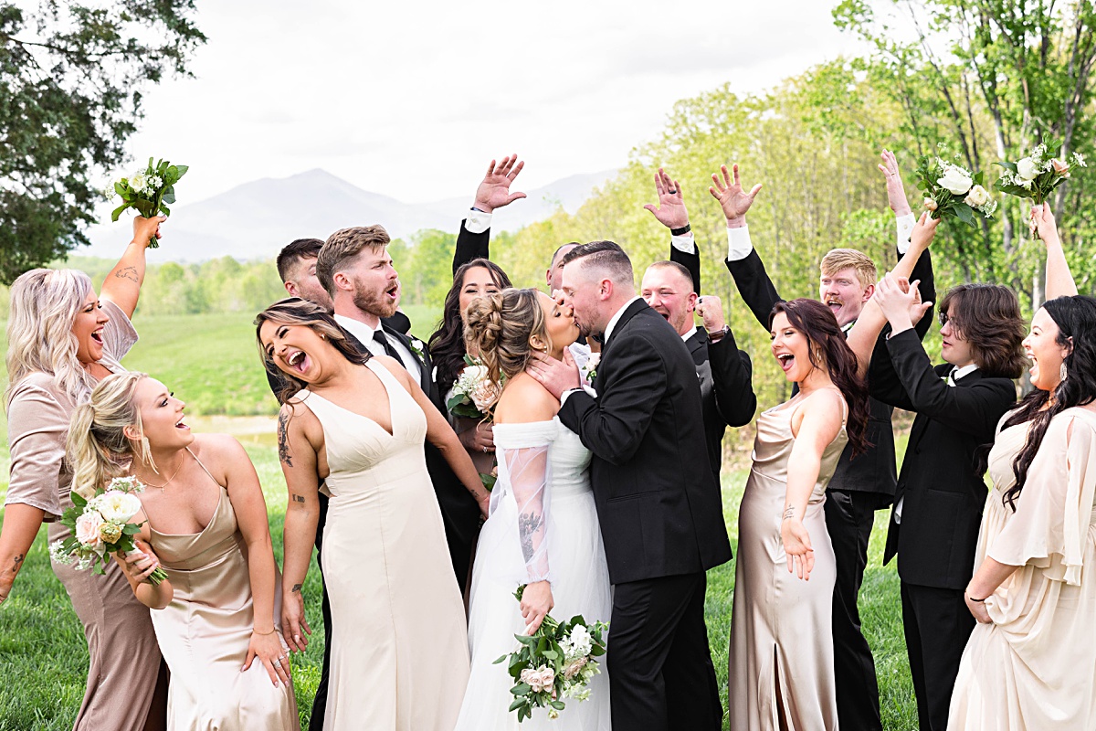 This elegant garden wedding at Cedar Oaks Farm features a classic car, stunning ceremony mountain view, unique bridal details, a boxer puppy, and a surprise baby gender reveal cake!