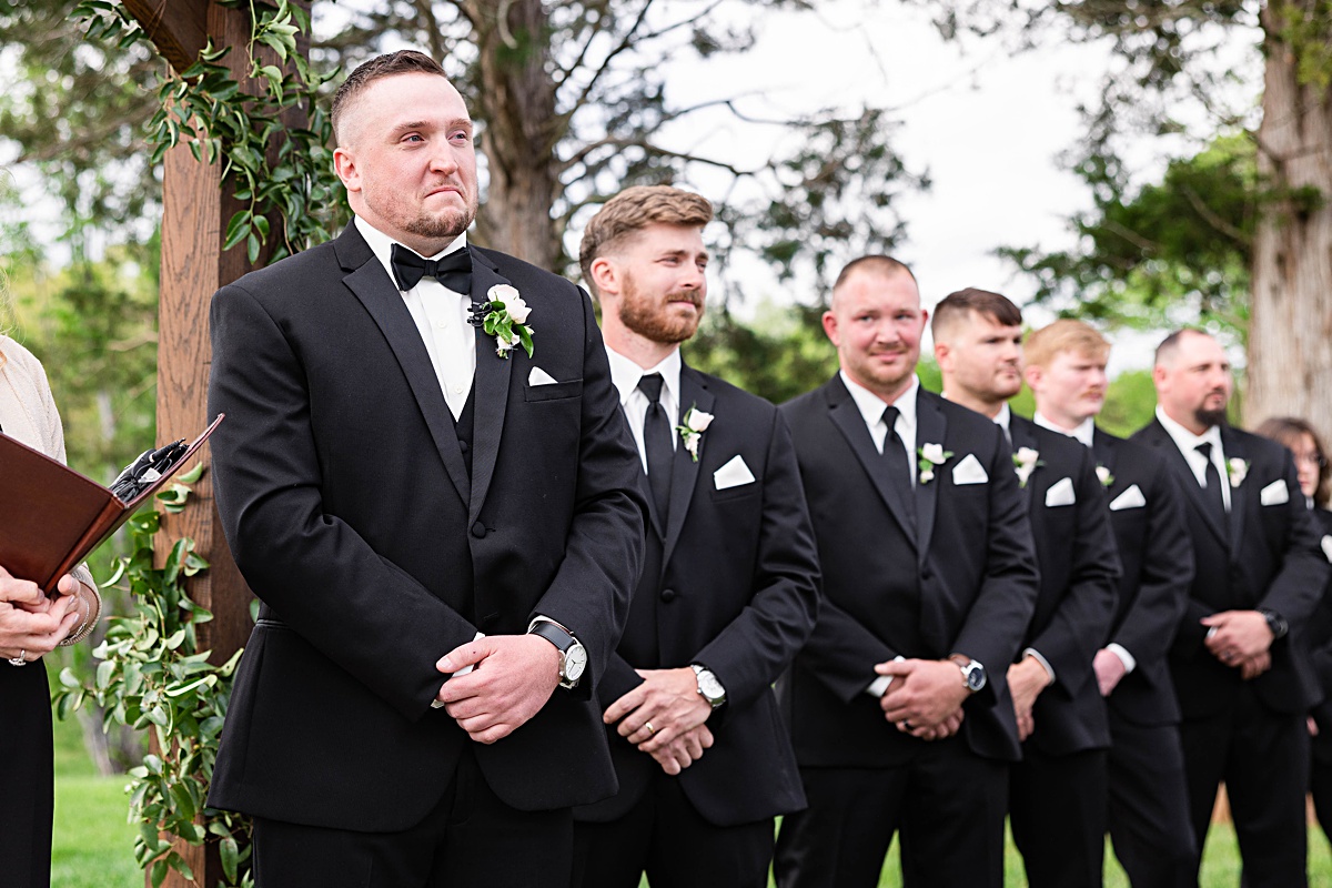 This elegant garden wedding at Cedar Oaks Farm features a classic car, stunning ceremony mountain view, unique bridal details, a boxer puppy, and a surprise baby gender reveal cake!