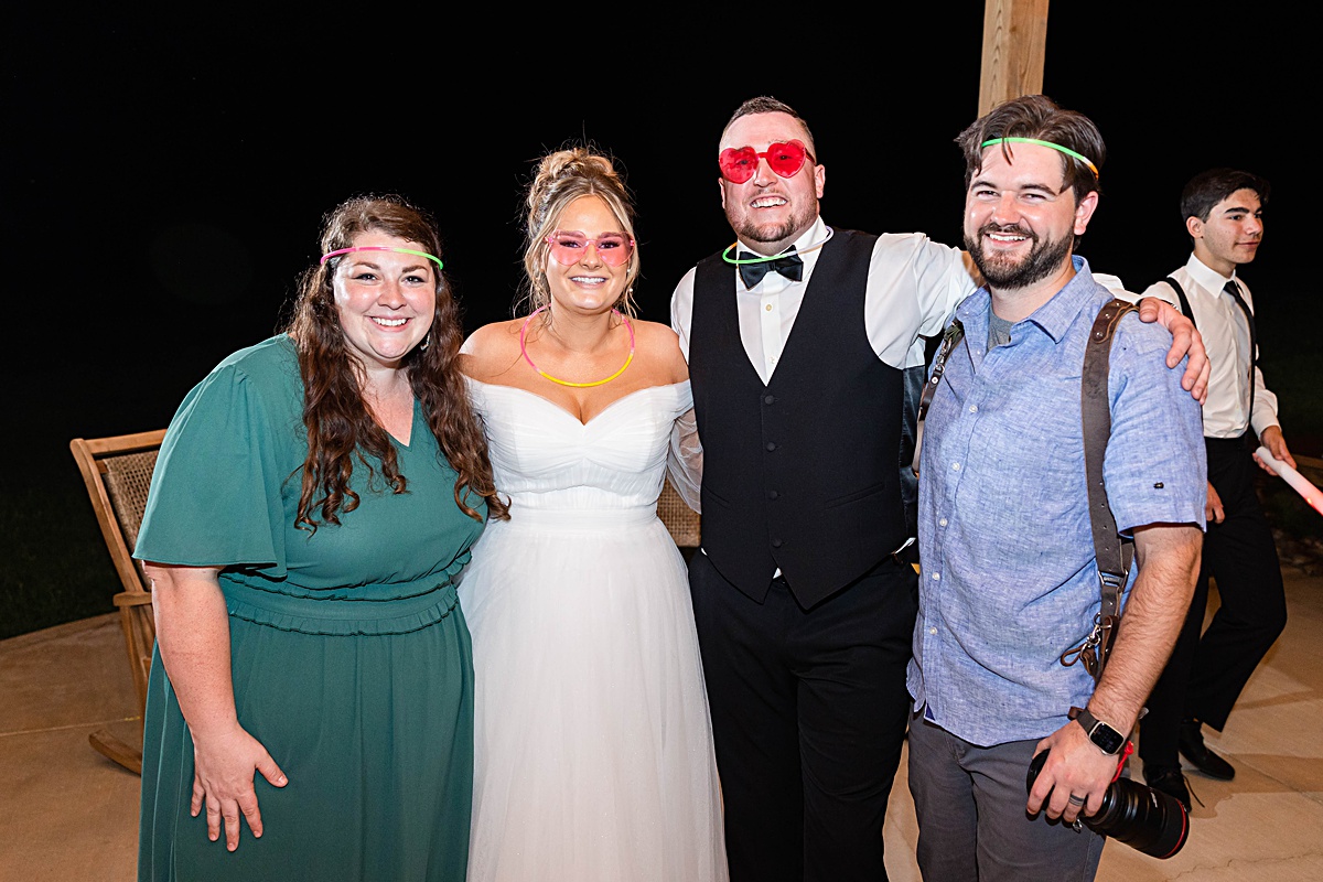 This elegant garden wedding at Cedar Oaks Farm features a classic car, stunning ceremony mountain view, unique bridal details, a boxer puppy, and a surprise baby gender reveal cake!