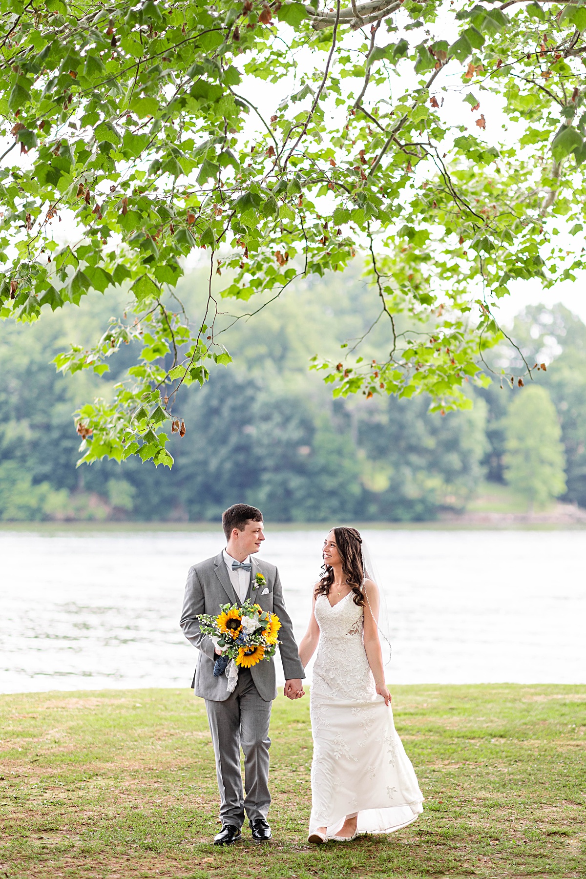 This summer lake wedding at Smith Mountain Lake is full of sweet first looks, a wedding full of traditions, and a surprise exit into the sunset!